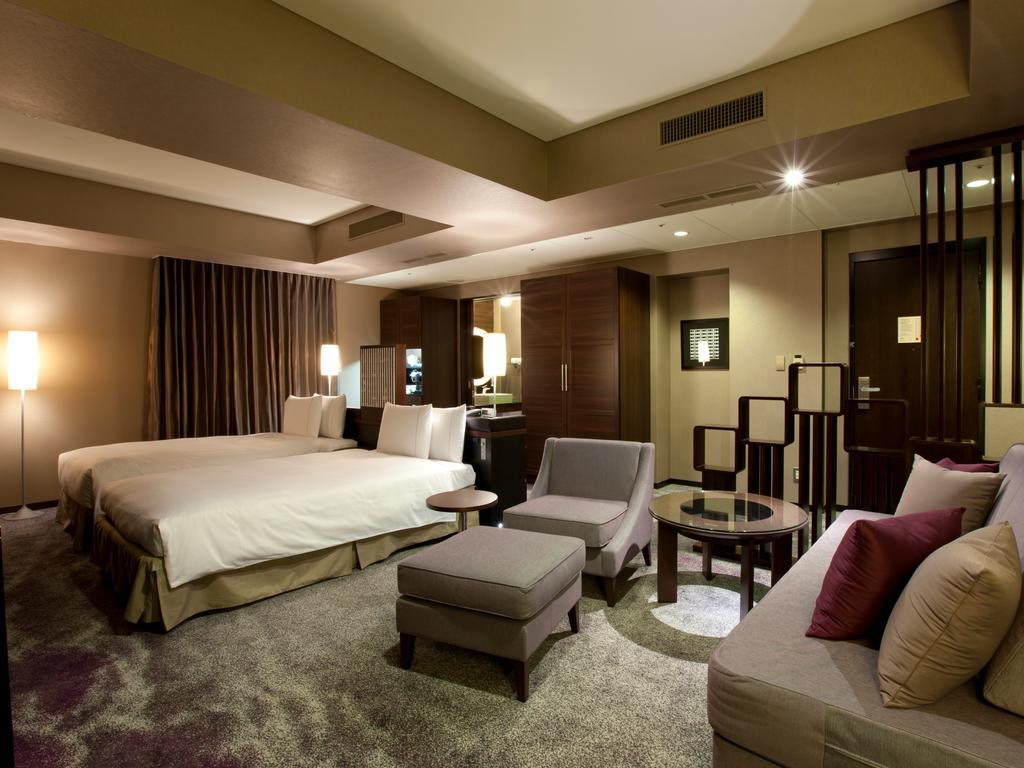 Suite Junior (4 adultos) - 2 camas individuales y 2 camas supletorias