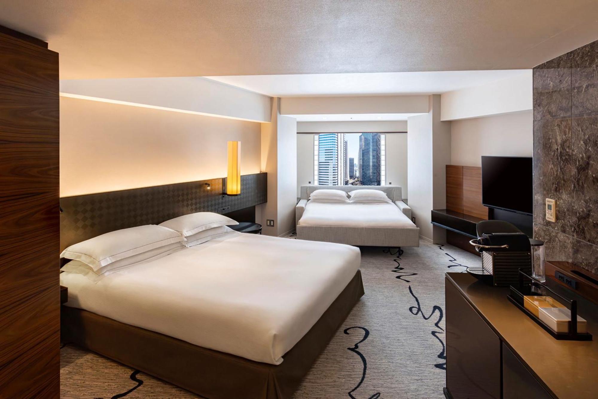 Habitación Premium con cama extragrande y sofá cama