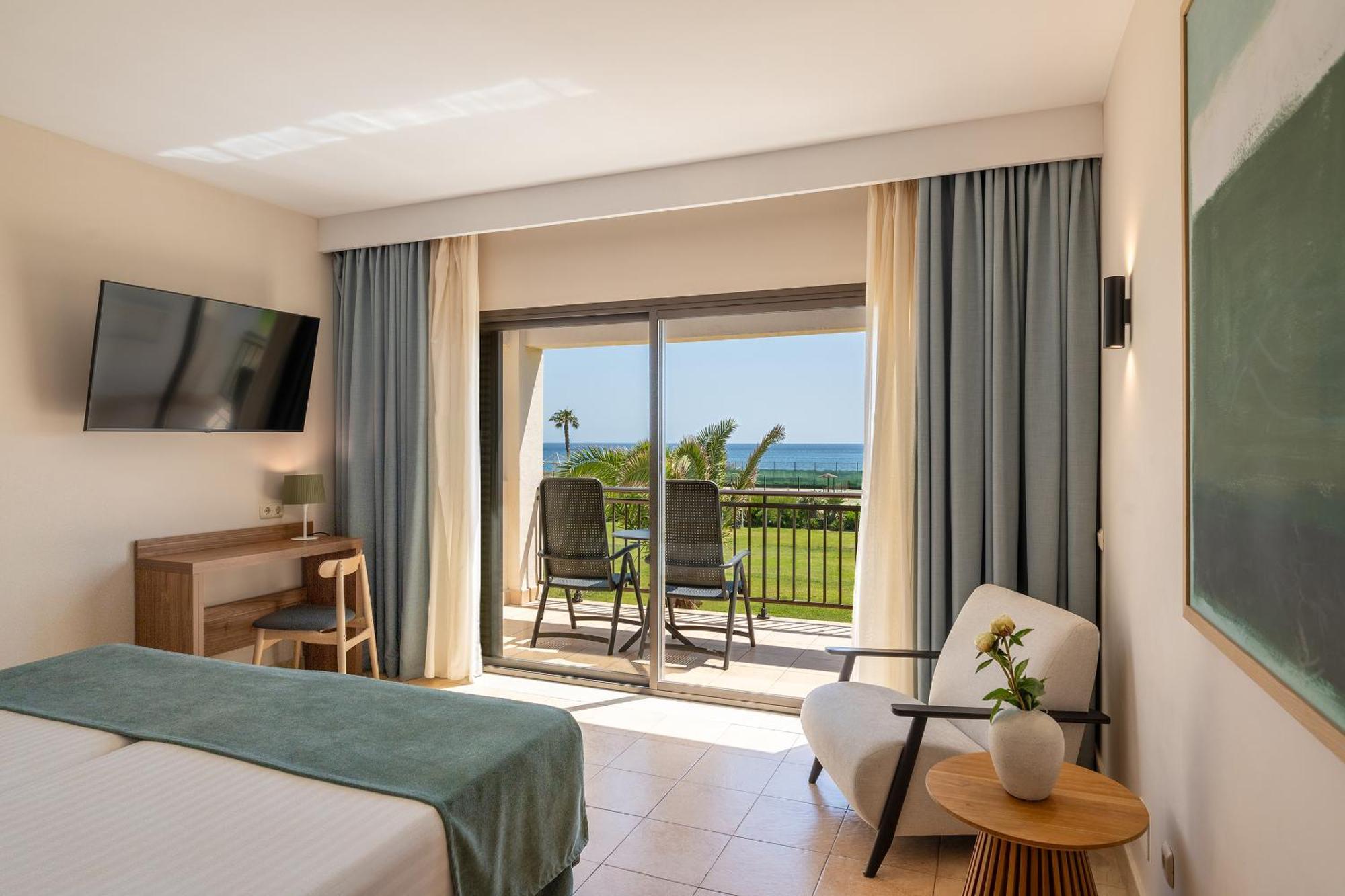 Habitación Doble con vistas al mar (2 adultos + 1 niño)