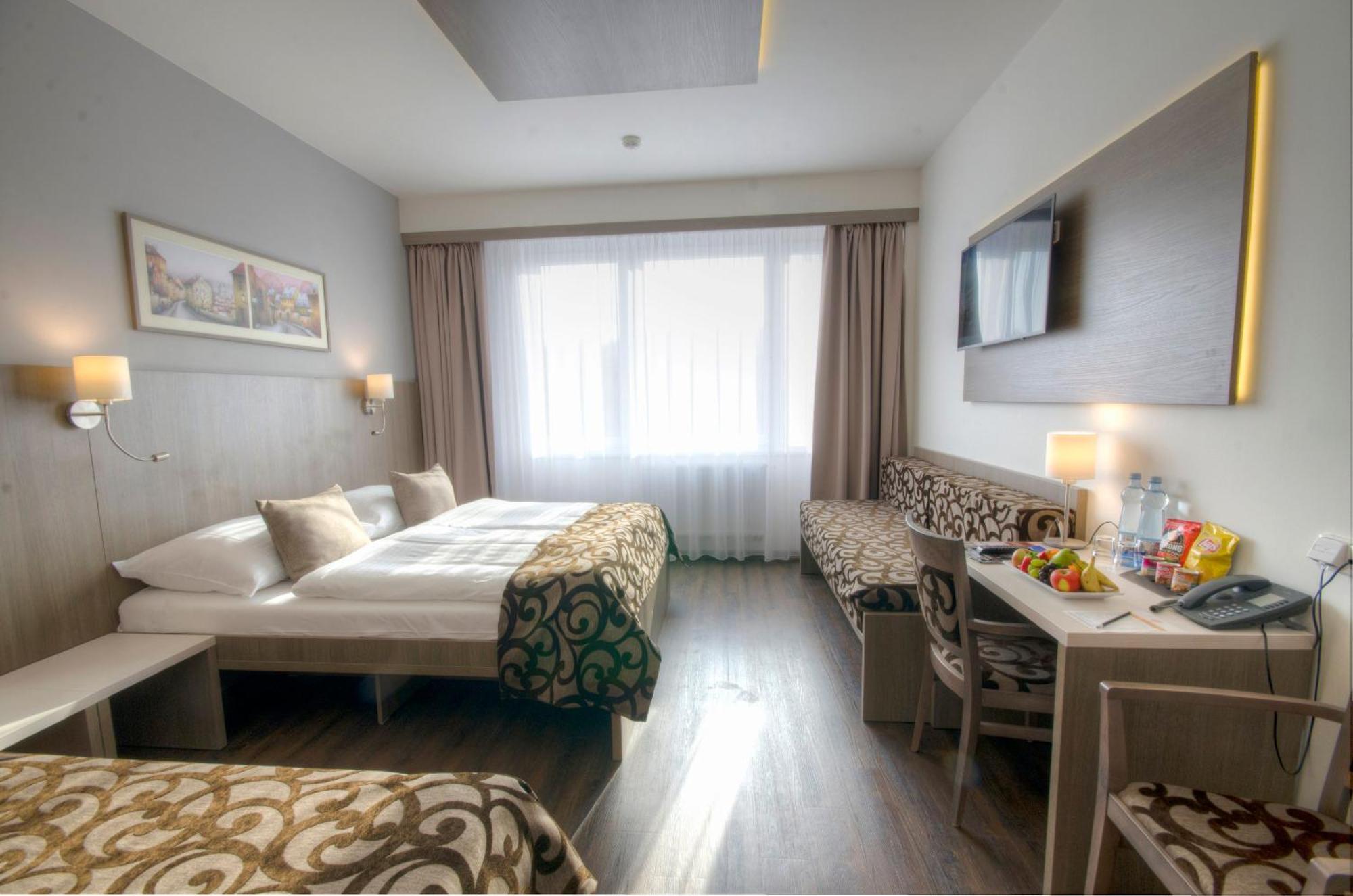 Habitación Triple Deluxe con acceso a la zona de aguas y sauna