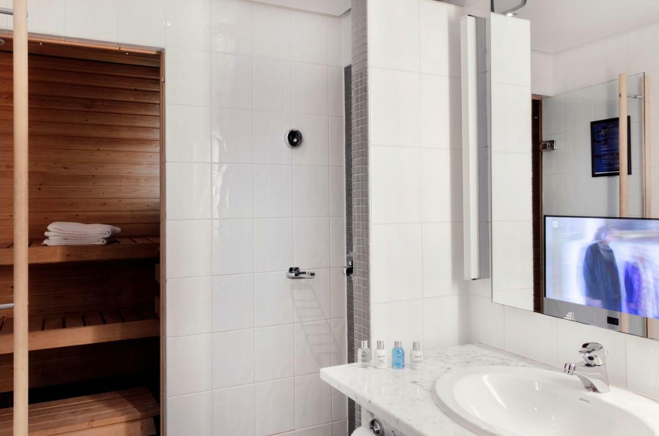 Habitación Business Executive con sauna y acceso al salón