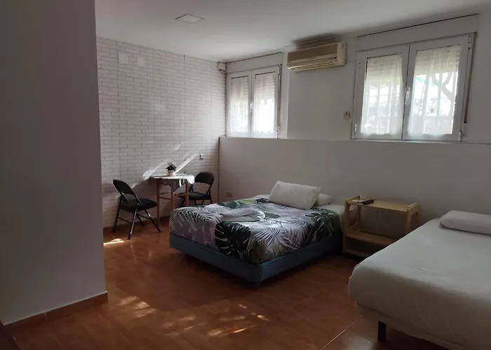 Hotel que admite mascotas: Apartamento y Habitaciones El Colmenar
